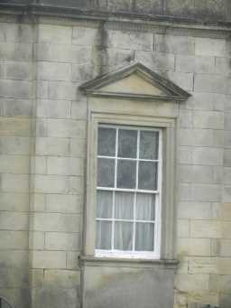 Oblique view of left window of East Lodge to Streathlam Castle October 2016